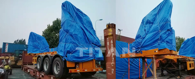 Self unloading container trailer